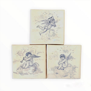 Putti majolica tiles set of three